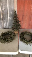 Christmas tree and two wreaths