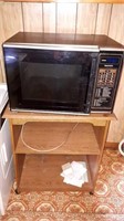 Kenmore microwave and stand. Condition unknown.