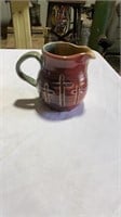Cross pottery pitcher