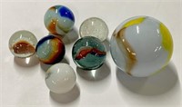 7 Larger Assorted Marbles