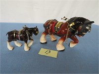2 ceramic work horses in harness,