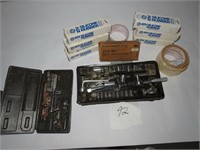 box of small sockets, silicone sealant & tape