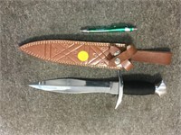 Large new knife with sheath