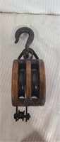 Antique wood and cast iron pulley