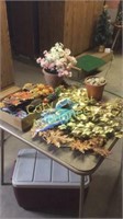 Table of brass decor, flower arrangement in