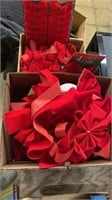 Two full boxes of red ribbons