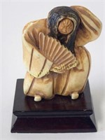 Netsuke With Revolving Face & Stand