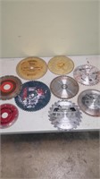 Nine assorted used saw blades.