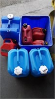 Four 5L Jerry cans and three water containers