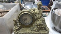 FIGURINE CLOCK