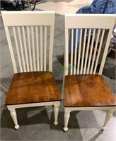 Matched pair larger size dining chairs, with