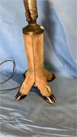 Antique Deerhoof table lamp, four legs together,