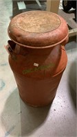 Antique metal milk can, two handles, with a lid,