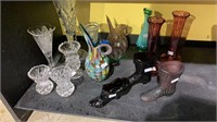 Collection of flower vases, including some