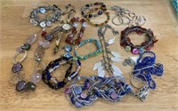 Group lot of costume jewelry, including some