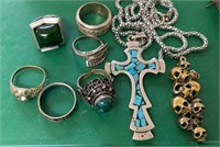 Six rings with a marked 925 Sterling silver cross