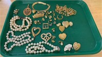 Tray lot of vintage goldtone costume jewelry,