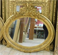 Bird Crowned Gilt Oval Mirror.