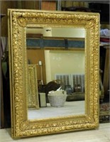 Ornate Gilt Beveled Mirror.