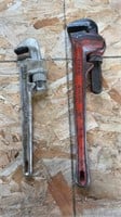Two heavy duty pipe wrenches