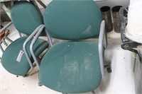 Two Green Chairs on Rollers and Stool