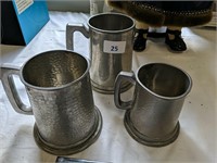 Three pewter mugs