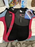 Two childs wetsuits