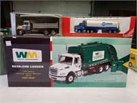 Waste Management Toy Truck, and (2) Toy Trucks