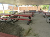 Twenty-Six Red and Blue Picnic Tables Under Red Bl