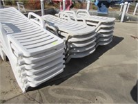 Sixty White Chaise Loungers: Some Showing Wear