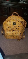 MCM Medium Backpack Cognac Studded

Broken /