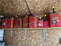 8) Plastic gas cans ranging from 1-5 gallons