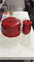 Red metal cake carrier and egg cooker