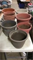 Lot of 13 plastic planting pots