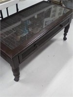 Brown coffee table With glass top