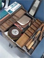 Metal tool box filled with woodworking tools