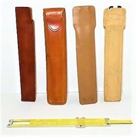 Four Manual Slide Rules in Cases