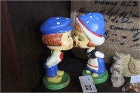 PAIR OF CERAMIC DUTCH KISSING NODDERS