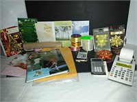 Various calculators, bows, ribbon and cards