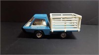 STRUCTO Truck by ERTL TOYS 
Tin and plastic
9.5