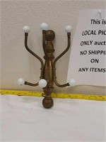 Brass coat hanger