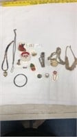 Locket necklace, sheriffs of pins, misc jewelry
