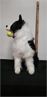 Stuffed dog with tennis ball in the mouth