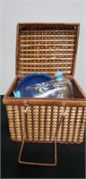 Basket with miscellaneous picnic dishes