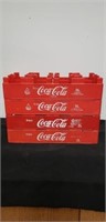 Four Coca-Cola crates