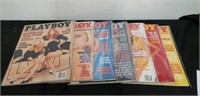 Issues of playboy magazines in protective sleeves