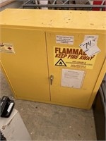 Yellow Justrite safety cabinet
