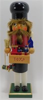 * Wooden Toymaker Nutcracker with His Box of Toys