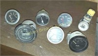 Box of assorted pressure gauges, fuel gauges,