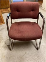 Maroon office chair, does not have wheels